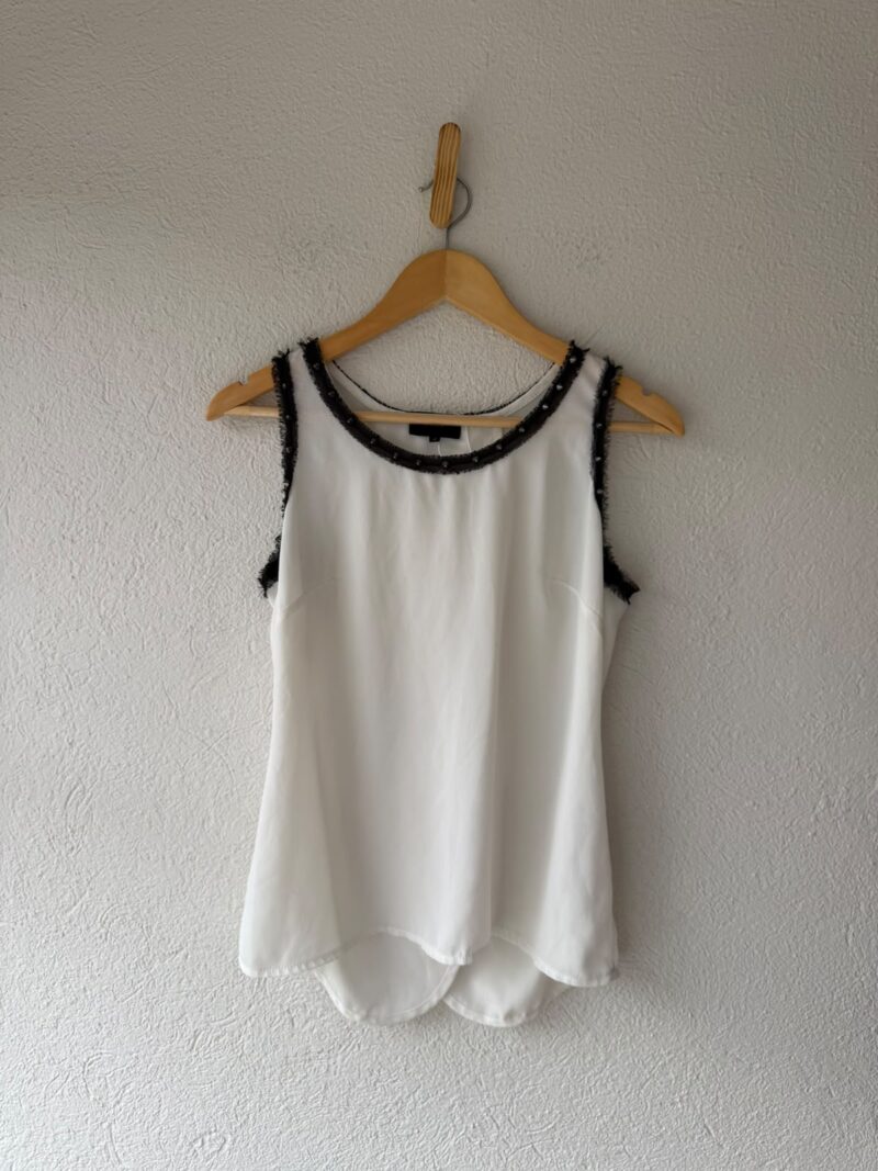 BLUSA CON ESTOPEROLES